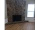 Stone fireplace in the living room at 701 Boone Ct, Stone Mountain, GA 30088