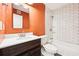 Updated bathroom with white subway tile and dark vanity at 2015 Huntingdon, Atlanta, GA 30350