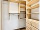 Walk-in closet with shelves and drawers for storage at 2015 Huntingdon, Atlanta, GA 30350