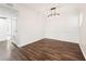 Simple dining room with hardwood floors and light walls at 2015 Huntingdon, Atlanta, GA 30350