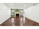 Living room with hardwood floors and a fireplace at 2015 Huntingdon, Atlanta, GA 30350