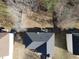 Partial aerial view of the back of the house showing the roof and part of the backyard at 4908 Topsfield Ln, Lithonia, GA 30038