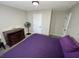 Bedroom featuring a ceiling fan, a dresser, and a comfy-looking bed at 4908 Topsfield Ln, Lithonia, GA 30038