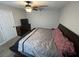 Spacious bedroom with king-size bed and dresser at 4908 Topsfield Ln, Lithonia, GA 30038