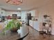 Bright kitchen with white cabinets, stainless steel appliances, and a view of the eating nook at 4908 Topsfield Ln, Lithonia, GA 30038