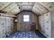 Unfinished basement with window, ample storage, and a vintage radio at 5762 Lilburn Stone Mountain Rd, Stone Mountain, GA 30087