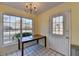 Breakfast nook with wood table and access to backyard at 5762 Lilburn Stone Mountain Rd, Stone Mountain, GA 30087