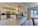 Kitchen with stainless steel appliances and white cabinets at 5762 Lilburn Stone Mountain Rd, Stone Mountain, GA 30087