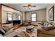 Living room featuring two sofas, coffee table and access to other rooms at 5762 Lilburn Stone Mountain Rd, Stone Mountain, GA 30087