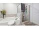 Relaxing bathroom with a soaking tub and a separate walk-in shower at 3948 Lake Manor Way, Atlanta, GA 30349
