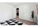 Bright bedroom with geometric rug and closet at 3948 Lake Manor Way, Atlanta, GA 30349