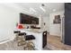 Kitchen with dark cabinets, granite countertops, and stainless steel appliances at 3948 Lake Manor Way, Atlanta, GA 30349
