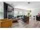Open living room featuring a modern fireplace and stylish furniture at 3948 Lake Manor Way, Atlanta, GA 30349