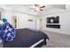 Spacious main bedroom with TV, fireplace, and ensuite bathroom access at 3948 Lake Manor Way, Atlanta, GA 30349