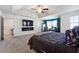 Bright main bedroom featuring a built-in fireplace and access to the bathroom at 3948 Lake Manor Way, Atlanta, GA 30349