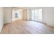 Light-filled dining room with hardwood floors and large windows at 1890 W Paces Ferry Nw Rd, Atlanta, GA 30327