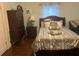 Bedroom with hardwood floors, double bed, dresser, and nightstand at 25 Johnson Rd, Atlanta, GA 30318