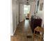 Hallway with tile floor and access to laundry and bath at 25 Johnson Rd, Atlanta, GA 30318