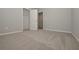 Bright bedroom with neutral carpet and closet at 509 Ajo Way, Dallas, GA 30157