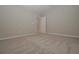 Simple bedroom with carpet flooring and an attached bathroom at 509 Ajo Way, Dallas, GA 30157