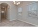 Bright dining room with chandelier and hardwood floors at 509 Ajo Way, Dallas, GA 30157