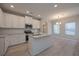 Modern kitchen with island and stainless steel appliances at 509 Ajo Way, Dallas, GA 30157