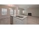 Kitchen island with double sink and granite countertop at 509 Ajo Way, Dallas, GA 30157