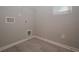 Laundry room with vinyl flooring and built-in shelving at 509 Ajo Way, Dallas, GA 30157