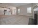 Open living room with fireplace and kitchen views at 509 Ajo Way, Dallas, GA 30157