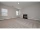 Living room with carpeted floor and fireplace at 509 Ajo Way, Dallas, GA 30157