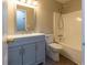 Charming bathroom with tub/shower combo and vanity with chrome hardware at 8255 Stonebrook Dr, Cumming, GA 30040