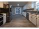 Kitchen with stainless steel appliances, lots of cabinets and a stainless steel refrigerator at 8255 Stonebrook Dr, Cumming, GA 30040