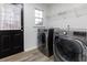 Laundry room with washer, dryer, and exterior access at 8255 Stonebrook Dr, Cumming, GA 30040