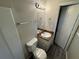 Clean bathroom with toilet, sink, and shower/tub combo at 1851 Irwin Bridge Nw Rd, Conyers, GA 30012