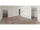 Bedroom with neutral carpeting and double closets at 6520 Roswell Rd # 106, Atlanta, GA 30328