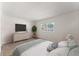 Spacious bedroom with large window and neutral carpeting at 6520 Roswell Rd # 106, Atlanta, GA 30328