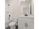 Stylish bathroom with white vanity, shower, and dark-grey tile floor at 2722 Byess Ct, Marietta, GA 30064