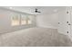 Bright bedroom with gray carpeting and three windows at 2722 Byess Ct, Marietta, GA 30064