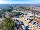 Aerial view showing home's placement in a community setting at 4960 Shade Creek Xing, Cumming, GA 30028