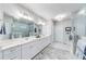 Elegant bathroom with double vanity, large shower, and marble countertops at 4960 Shade Creek Xing, Cumming, GA 30028