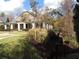 Community clubhouse with inviting porch and landscaping at 4960 Shade Creek Xing, Cumming, GA 30028