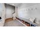 Mudroom with bench seating and coat hooks at 4960 Shade Creek Xing, Cumming, GA 30028