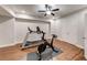 Basement gym with a treadmill and stationary bike at 4960 Shade Creek Xing, Cumming, GA 30028