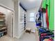 Well-organized walk-in closet with custom shelving and a window at 4960 Shade Creek Xing, Cumming, GA 30028