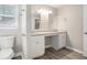 Updated bathroom with double vanity and granite countertop at 7270 Oswego Trl, Riverdale, GA 30296