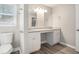 Modern bathroom with double vanity and granite countertop at 7270 Oswego Trl, Riverdale, GA 30296