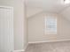 Charming bedroom with sloped ceiling and closet at 7270 Oswego Trl, Riverdale, GA 30296