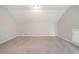 Large bedroom with sloped ceilings and ample space at 7270 Oswego Trl, Riverdale, GA 30296