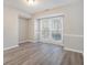 Bright dining room with hardwood floors and large windows at 7270 Oswego Trl, Riverdale, GA 30296