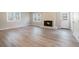 Living room with fireplace and hardwood floors at 7270 Oswego Trl, Riverdale, GA 30296